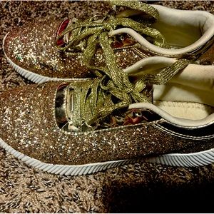 Women’s gold glitter tennis shoes gently worn
